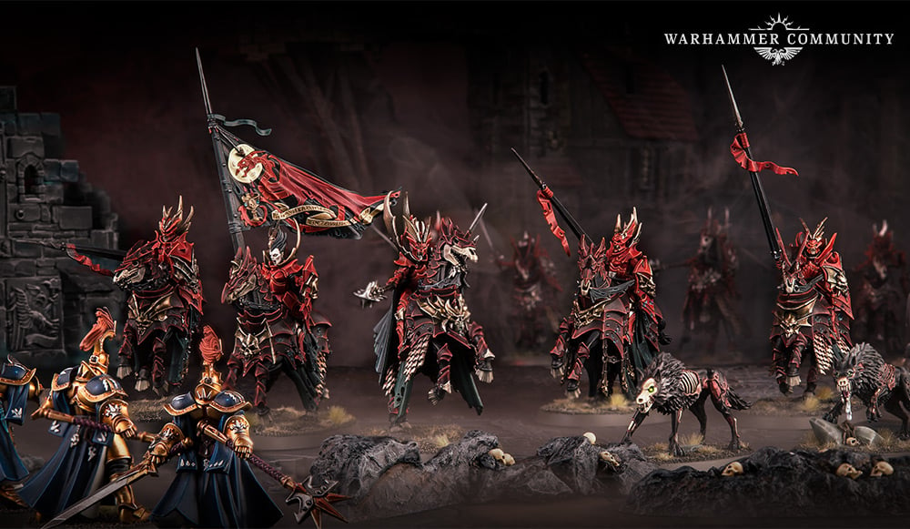 A group of model Blood Knights, vampires riding skeletal steeds, dressed in vivid red armour.